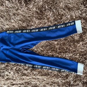 Nike women’s Leggings in Blue with Just Do It Trim
